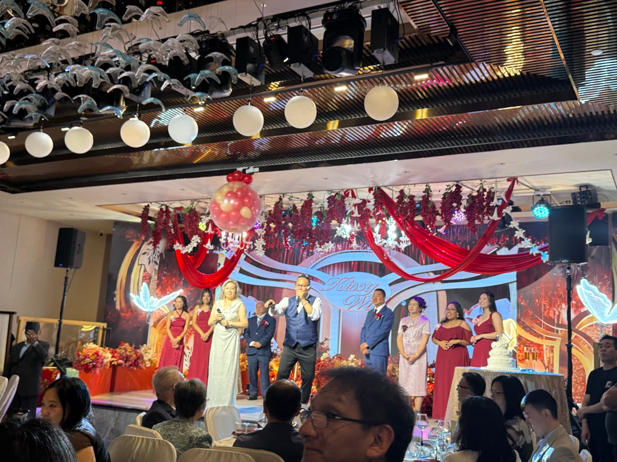 Hosts addressing guests from the stage