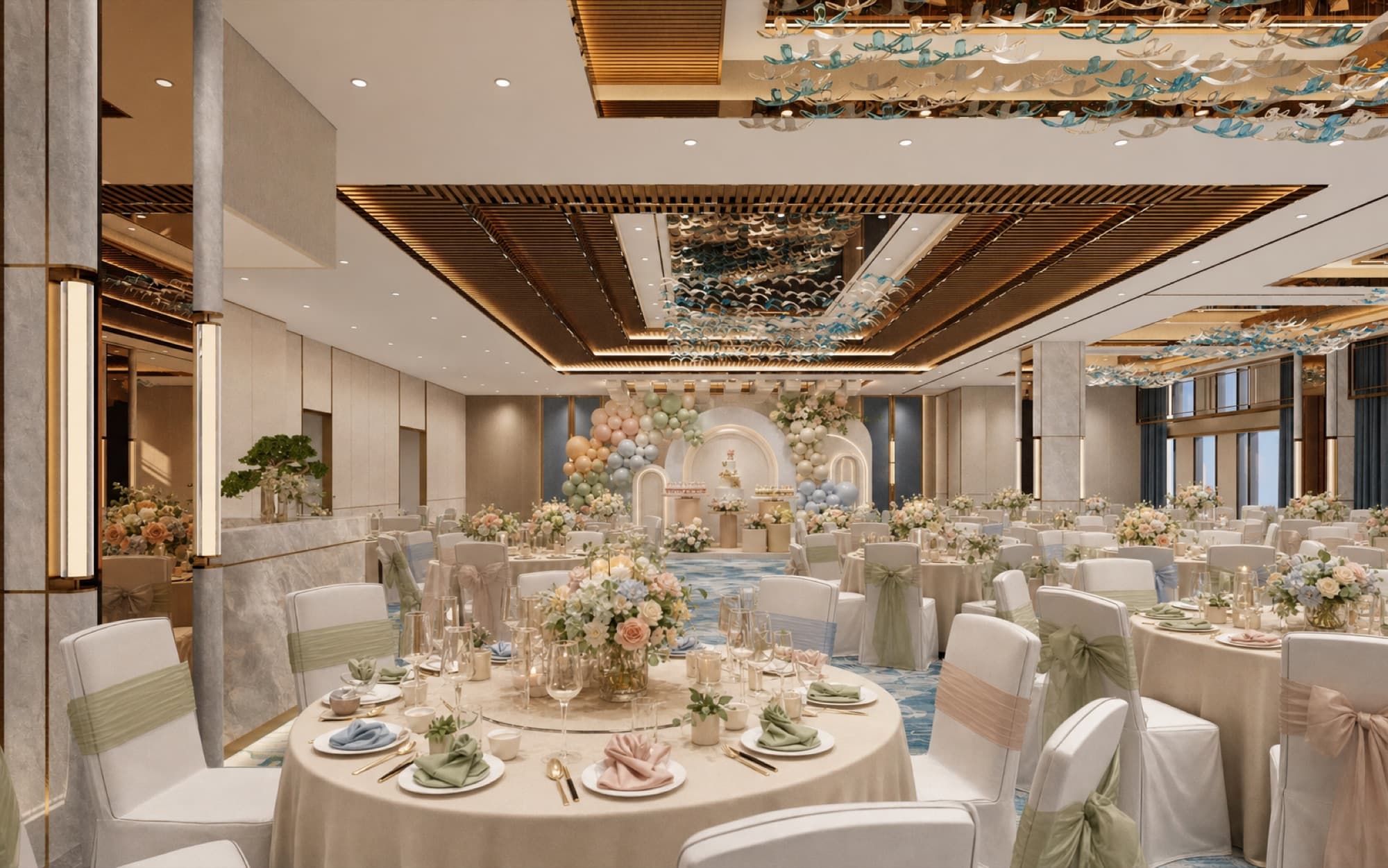 The grand ballroom dressed in pastels for a birthday banquet