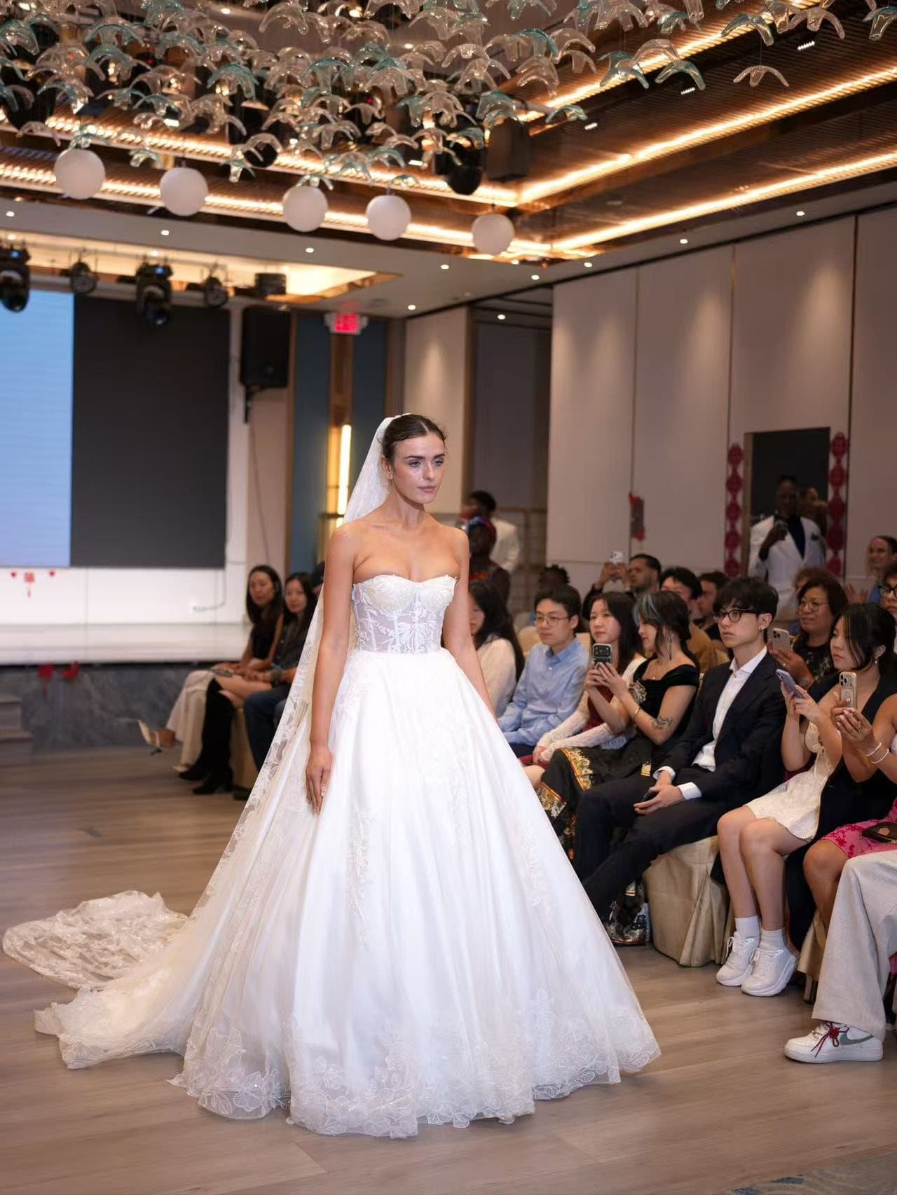 A bridal ballgown walked past the front row