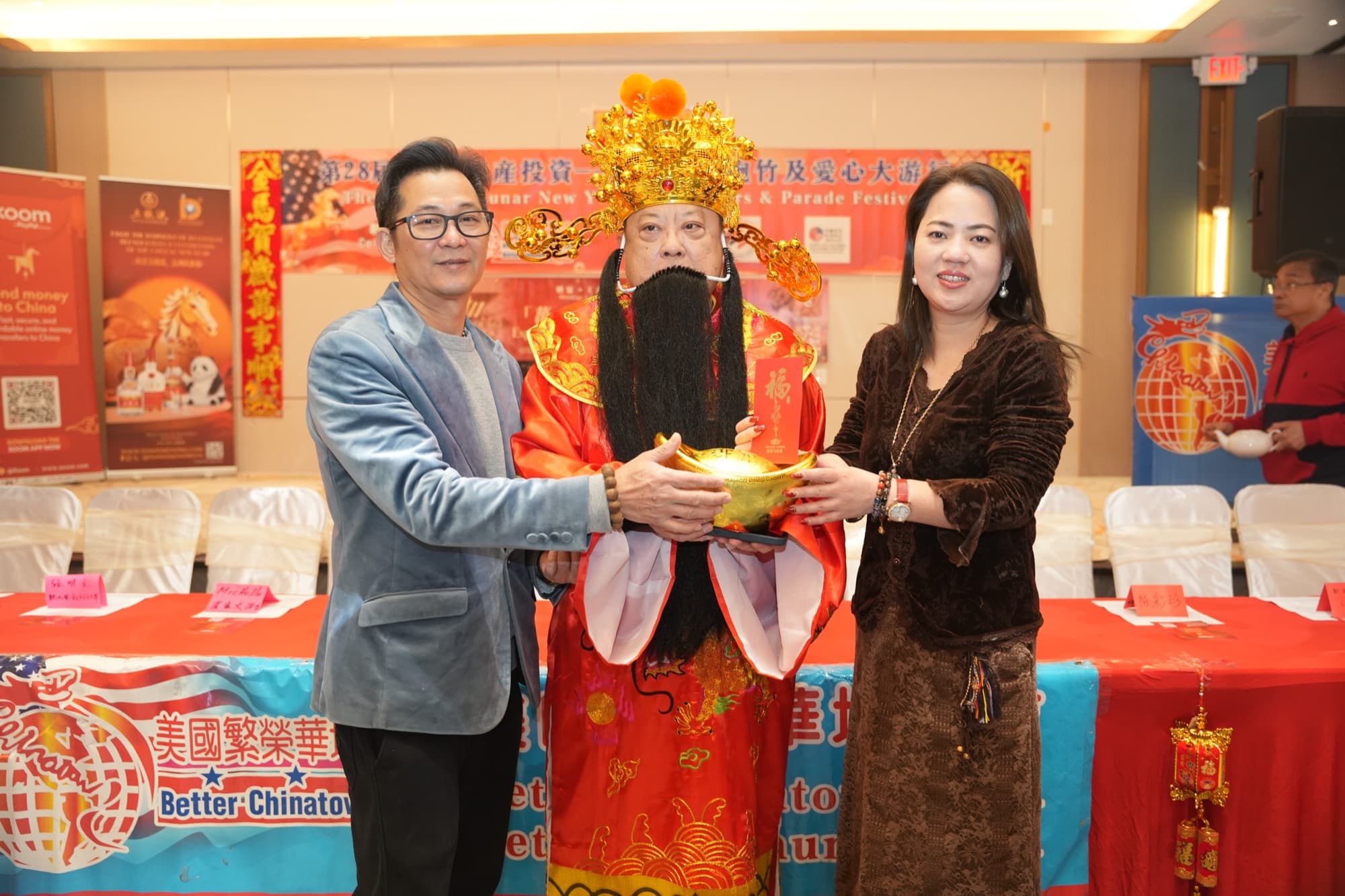 A God of Wealth blessing at a community celebration