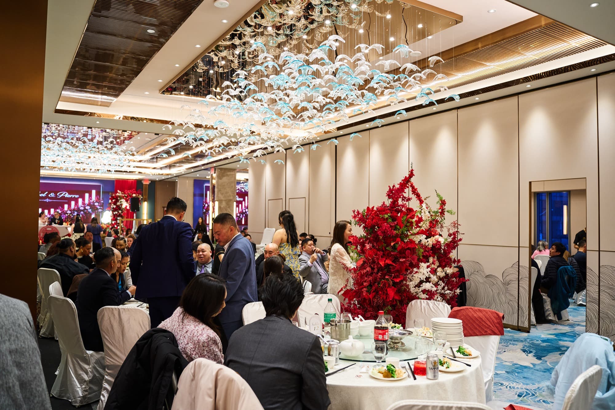 Wedding banquet table with floral centrepiece