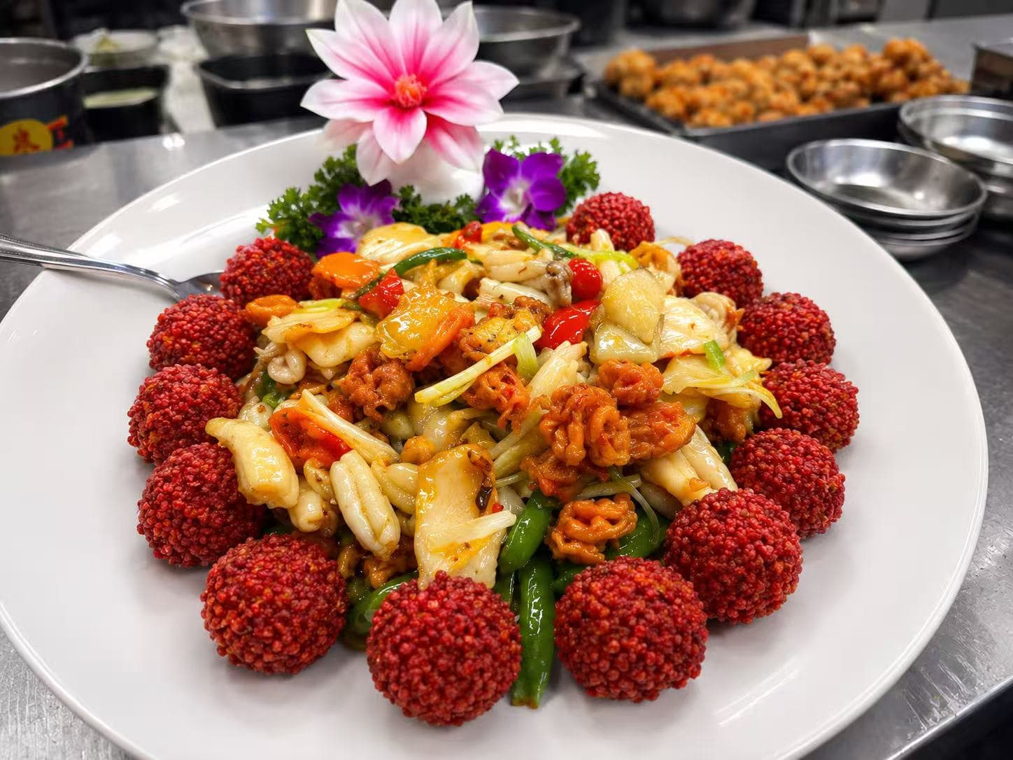 Wok-fried seafood ringed with crispy pearl balls