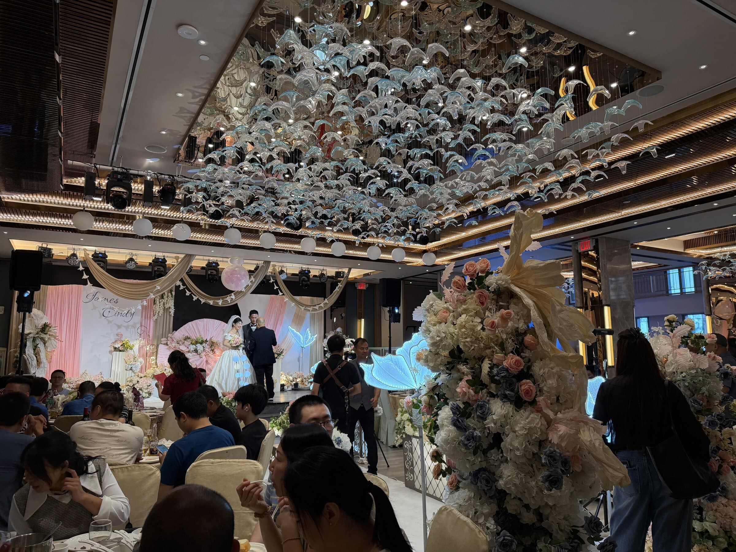 Wedding stage and floral installation in the grand hall