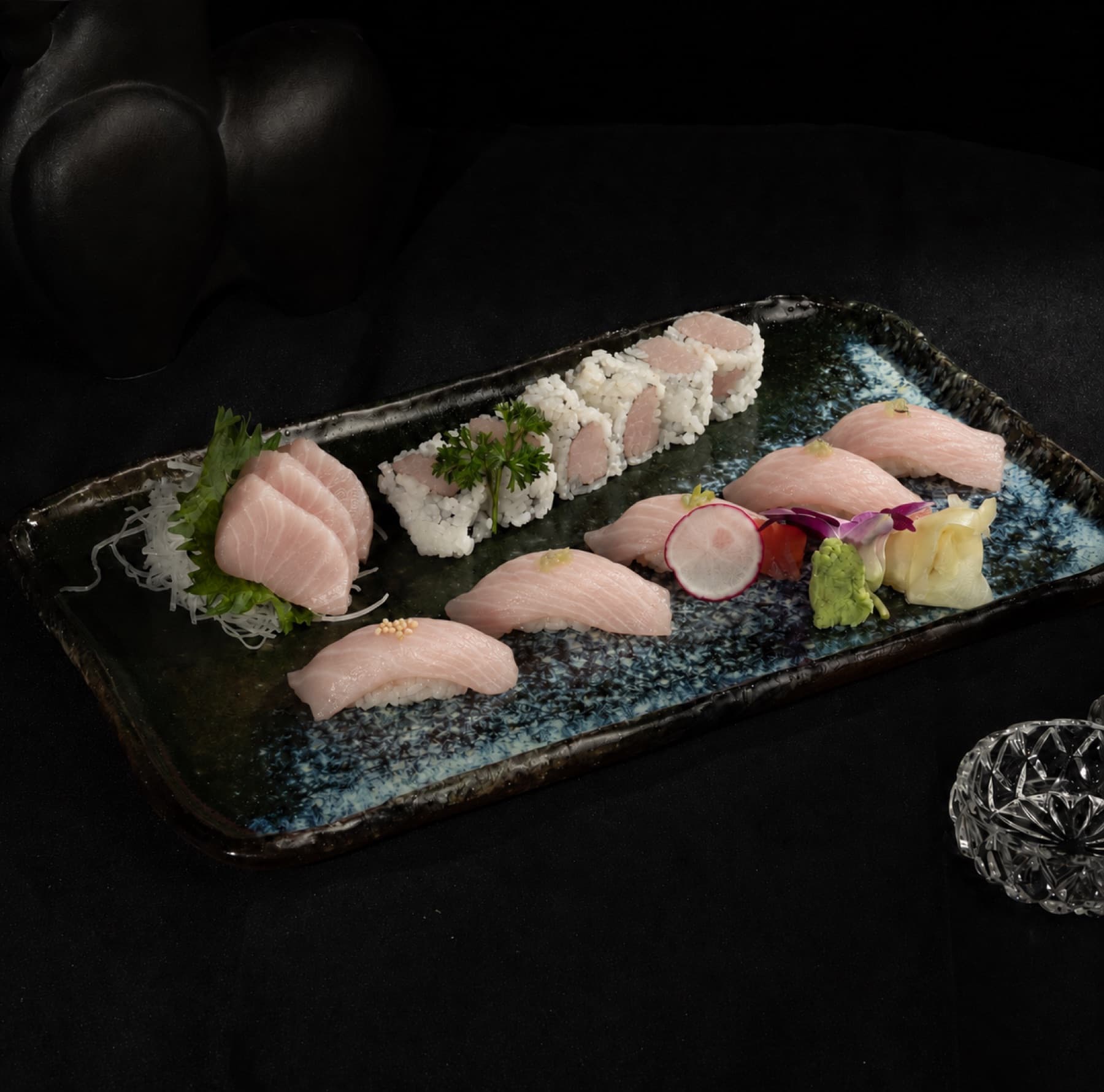 Yellowtail sashimi, nigiri and roll selection